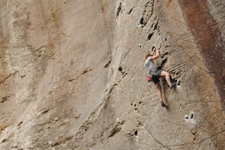 Brent climbs on sandstone, a type of rock described in the article that brings literacy in the science classroom.