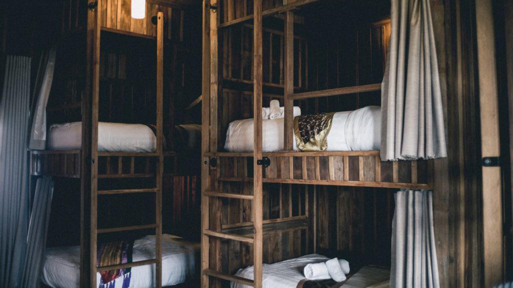 Wooden bunk beds in hostel