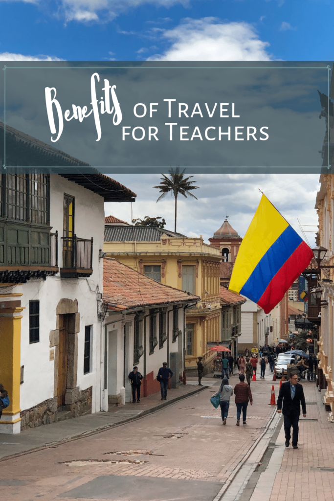 Image: Urban street, large Colombian flag flying. Text: Benefits of Traveling for Teachers